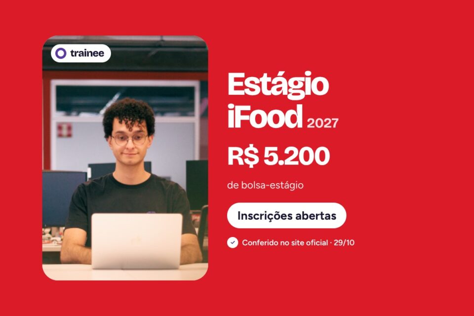 Jovem de óculos e cabelo cacheado usa notebook em escritório moderno com monitores ao redor. Estágio iFood 2027: R$ 5.200 de bolsa-estágio. IA para Tech e Negócios, Início em fev/2027, Onboarding em Osasco.